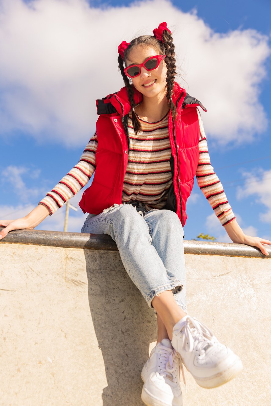 Young Woman in Bright Trendy Outfit Outdoors